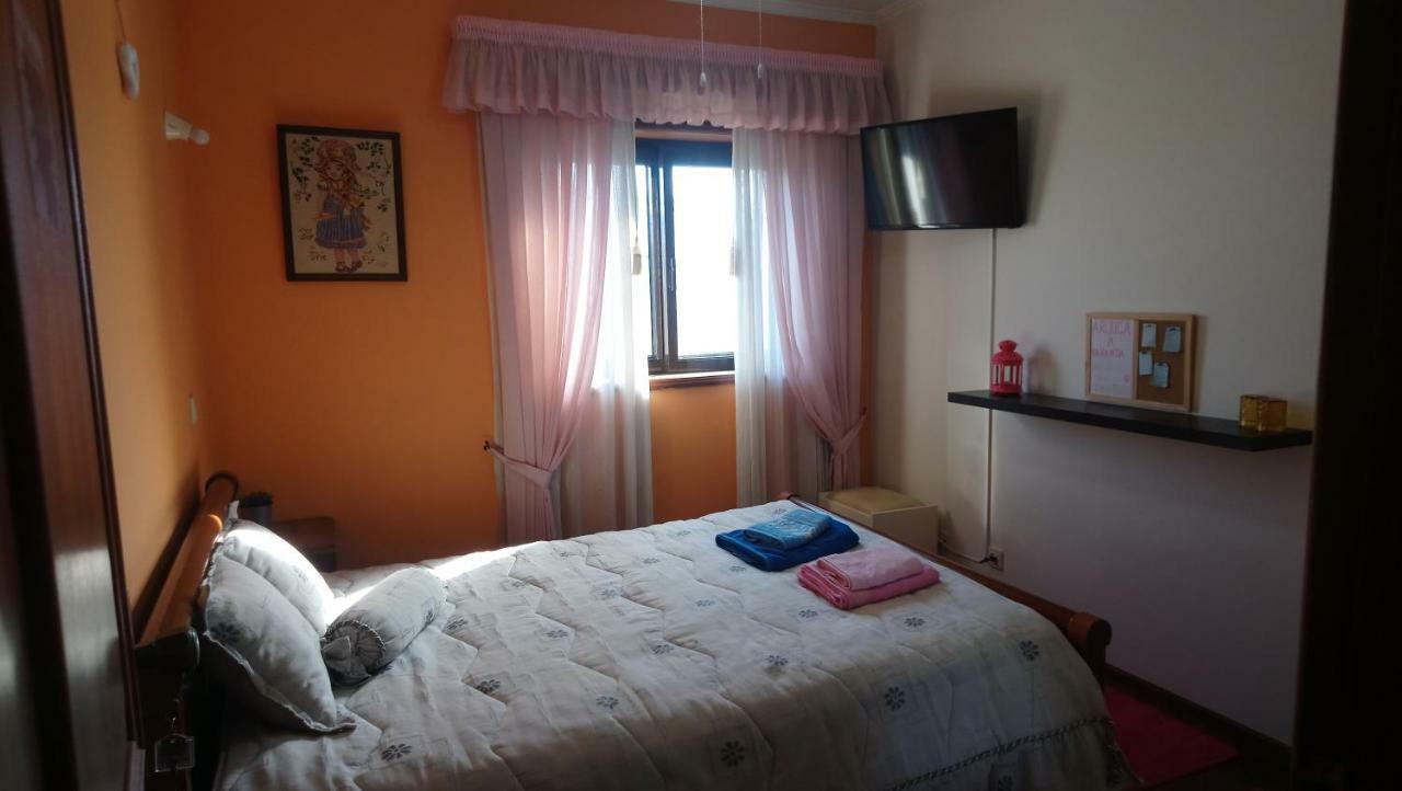 Quarto em Acomodações Particulares à Varanda *